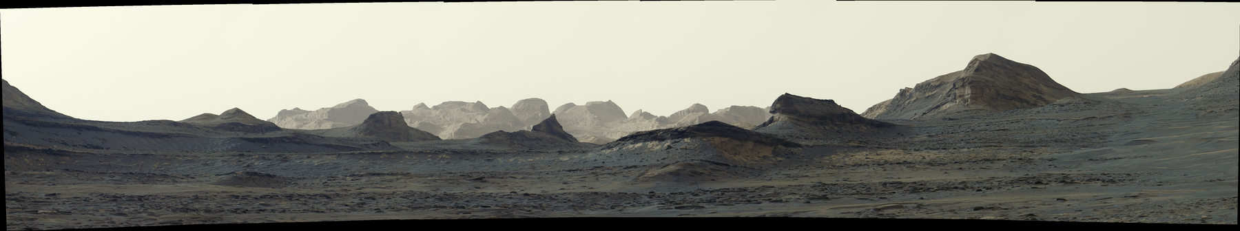 Enlarged Curiosity Mastcam panorama of morning light reaching distant wind-carved yardangs across northwestern Mount Sharp.